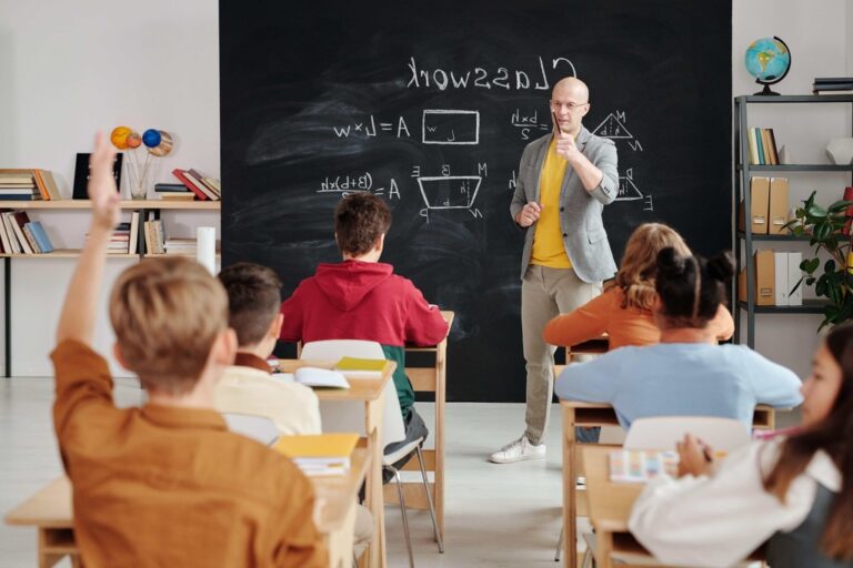 classroom with students and a teacher